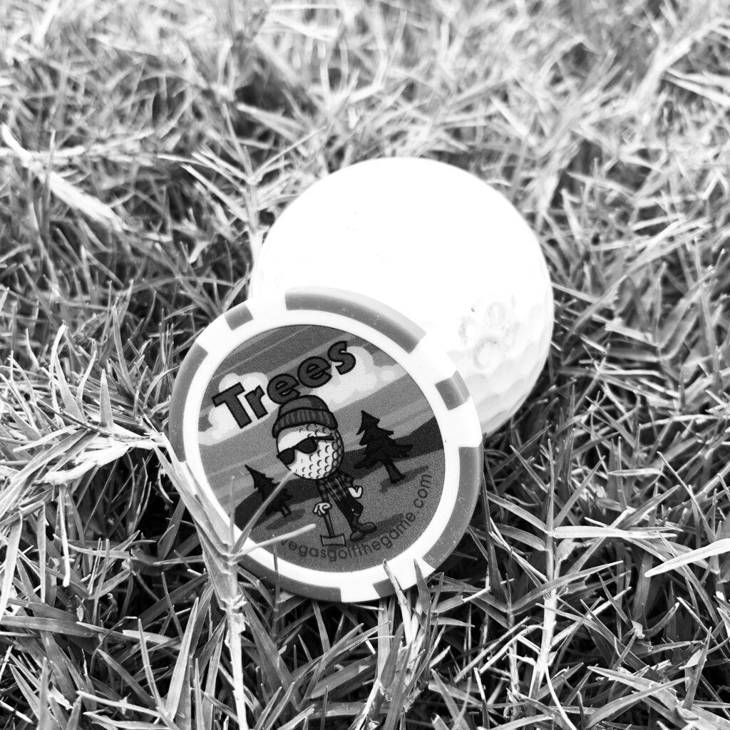 Yes, my golf ball may have hit the tree. Unfortunately, that means I had to take the negative token